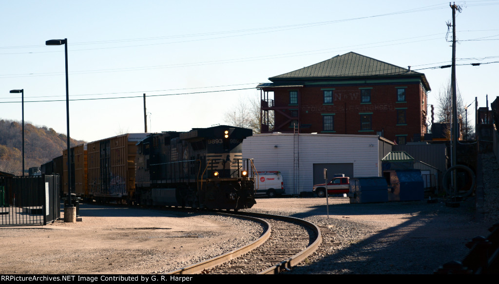 Yard job E19 eases past the skateboard park to the left.  Lynchburg's Union Station used to sit here